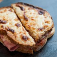 Croque Monsieur Sandwich · French ham and melted Swiss cheese with Bechamel sauce on country bread.