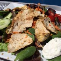 Grilled Chicken and Goat Cheese Salad · Served with avocado, grated carrots, radishes and cucumber on mixed greens, herb vinaigrette...