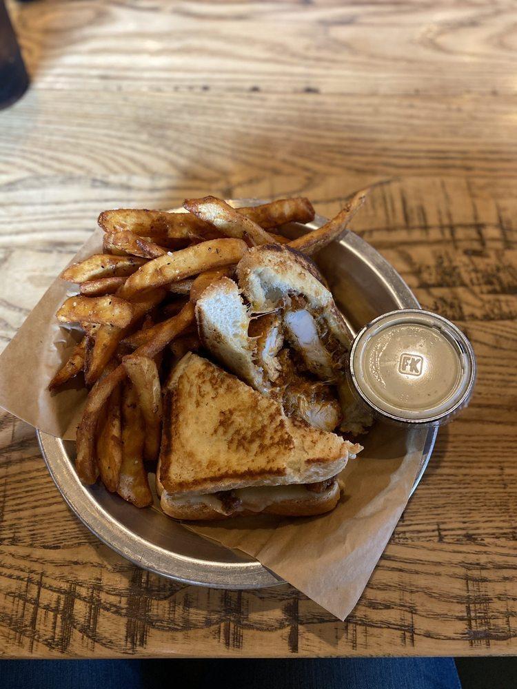 Buffalo Chicken Sandwich · Buffalo-sauced chicken tenders & Monterey Jack on Texas toast with a side of miss fancy's ranch (please note that the fried tenders are not gluten free).