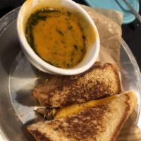 Classic Grilled Cheese Sandwich · Cheddar, Monterey Jack & American cheeses on Texas toast.