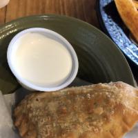 Spinach and Goat Cheese Empanada · 
