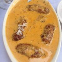 Vegetable Malai Kofta · Homemade vegetable balls cooked with a creamed curry sauce of onions, garlic, ginger and cas...