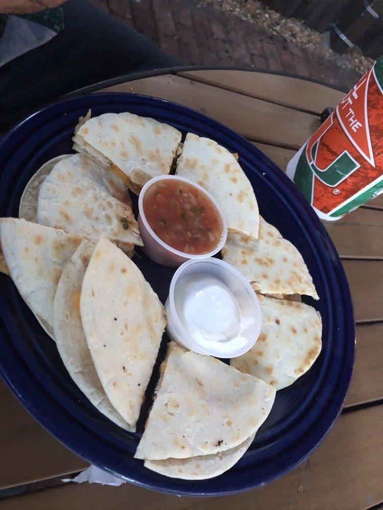 Chicken and Cheese Quesadilla · Char grilled chicken, cheddar cheese. Served with salsa and sour cream.
