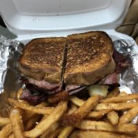 New Yorker Sandwich · Hot pastrami, corned beef, Swiss cheese, and spicy mustard on rye bread.