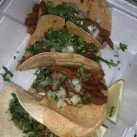Pastor Taco · Topped with diced onion and cilantro. Choice of corn or flour tortilla.