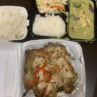 Green Curry · Spicy green curry in coconut milk with choice of meat,green bean, bamboo shoots, eggplant, b...