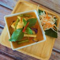 Red Curry · Spicy red curry in coconut milk with choice of meat, green beans, bamboo shoots, eggplants, ...