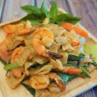 Pad Kee Mao · Drunken noodle. Stir-fried flat rice noodles with choice of meat, garlic, bell peppers, toma...