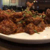 Chicken Lollipops · Marinated fried chicken wings in tomato garlic chilly sauce.
