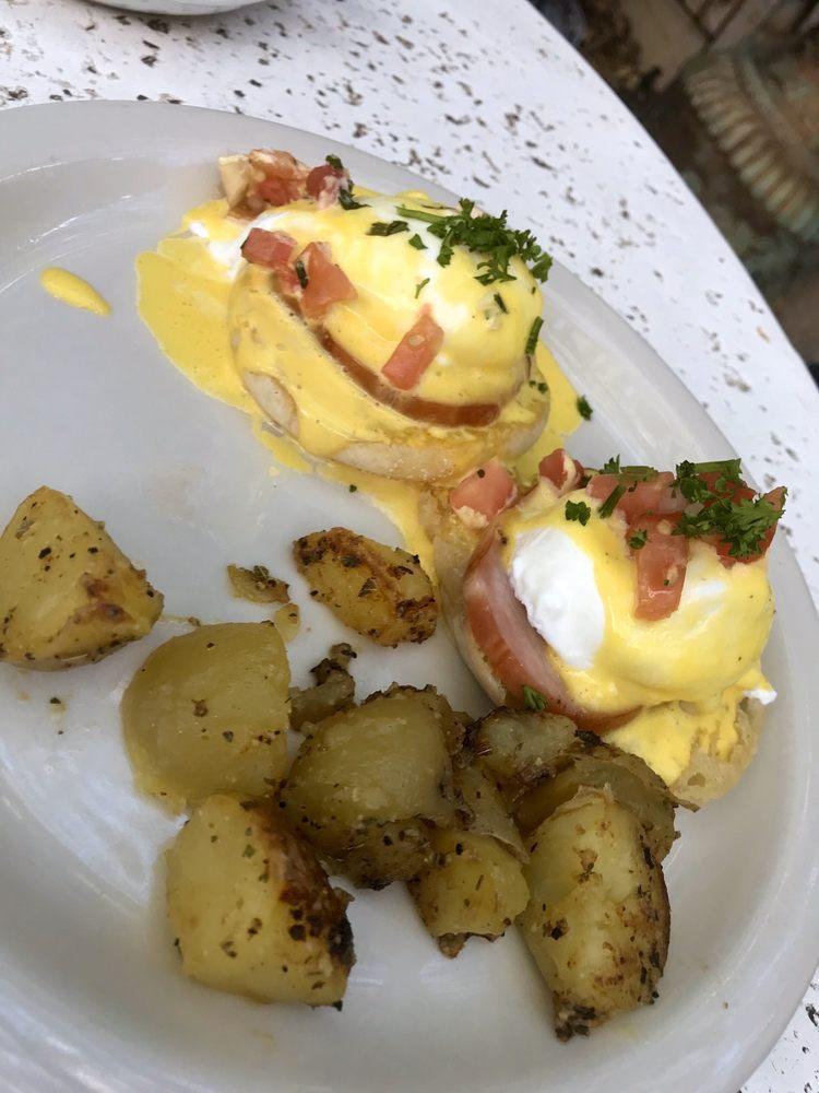 Eggs Benedict · 2 poached eggs on Canadian bacon served on an English muffin with homemade Hollandaise sauce poured on top.