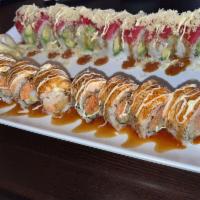 Tuna Lover Roll · Raw. Tempura shrimp, avocado inside, fresh tuna, crunch, and tobiko on top with eel sauce an...