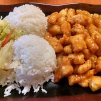 Orange Chicken · Orange chicken served with rice and steamed vegetables