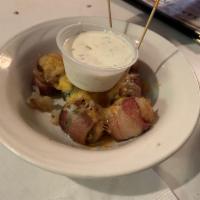 Bacon Wrapped Little Smokies · Smokies wrapped in brown sugar and cayenne glazed bacon. Served with ranch dressing.