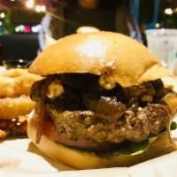 You're My Boy Blue Burger · Crumbled blue cheese, blue cheese spread, cracked peppercorn seasoning, balsamic caramelized...