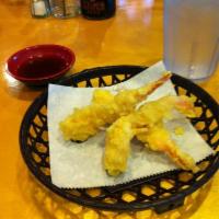 Shrimp Tempura · 6 lightly battered shrimp deep-fried served with tempura sauce.
