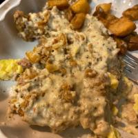 Country Fried Steak and Eggs · A bluebird legend: tender batter crisp steak cutlet covered in savory sausage gravy and topp...