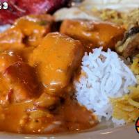 Chicken Tikka Masala · Tender pieces of chicken tempered with yogurt and herbs, roasted in our tandoor and then sim...
