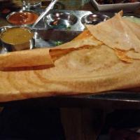 Mysore Masala Dosa · A masala dosa with a layer of spicy chutney applied to the inside of the crepe.