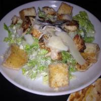 Caesar Salad · chopped romaine lettuce, garlic croutons, house-made Caesar dressing, parmesan crisp, balsam...