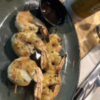 Grilled Shrimp Alfredo · Fettuccine pasta, parsley & garlic bread