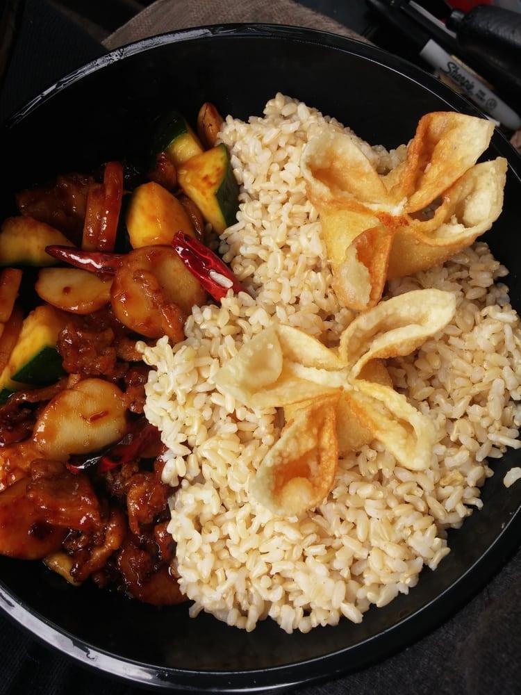 Kung Pao Chicken · A blazing sauce with seared chilies, peanuts, water chestnuts, zucchini and dry chili peppers. Spicy.