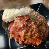 Lasagna · Beef crumbles, almond ricotta, spinach, marinara, basil & Parmesan.