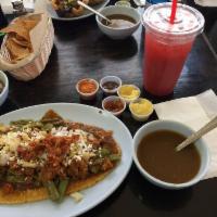 Huarache · Carne asada o pollo. Your choice of beef or chicken huarache served with cactus, chorizo, ch...
