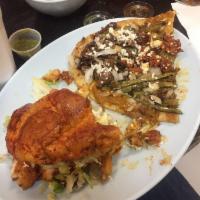 Pambazo · Spicy Mexican sandwich filled with potatoes, cilantro, chorizo, lettuce, cheese & sour cream.