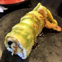 Green Dragon Roll · Shrimp tempura inside, avocado on top, eel sauce and sesame seed.