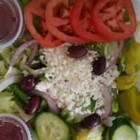 Greek Salad · Mixed lettuce, tomatoes, cucumbers, onions, green peppers, Greek olives, pepperoncini pepper...