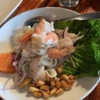 Ceviche Mixto · Served with white fish, shrimp and calamari seasoned with red onions, fresh lime juice, cila...