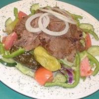 Gyro Salad · Lettuce, tomato, onion, green pepper, cabbage, carrots, cucumber, feta cheese, Kalamata oliv...