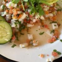 Pescado Ceviche Plate · Fish, onion, tomato, cilantro, cucumber & Serrano peppers marinated in lime juice.