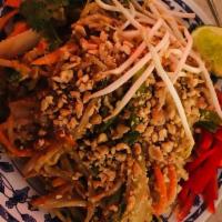 Pad Thai · Tamarind, carrot, bean sprout, egg, crushed peanut, lime, cilantro. Gluten-free upon request...
