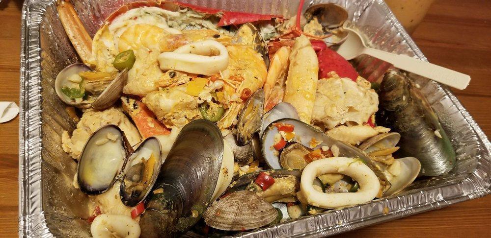 Seafood Combo Platter · 1/2 lobster, 1/2 crab, clams, mussels, prawns, squid and fish.