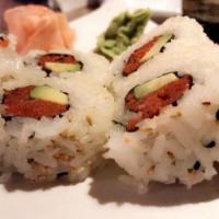 Spicy Tuna Roll · Avocado and spicy tuna with seasoned sushi rice.