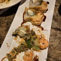 Spurs Roll · Shrimp tempura, cream cheese, inside, topped with avocado, spicy crab, eel sauce and spicy m...