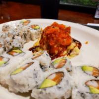 Volcano Roll · Crab stick, cream cheese, inside, topped with avocado, baked fish, eel sauce and tempura cru...
