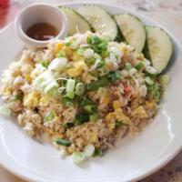 Crab Fried Rice · Fresh, jasmine rice stir fried with shredded crab, mixed vegetables and green onion.
