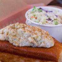 Crab Roll · Atop toasted artisan split-top bun. Lightly dressed with mayo, butter and spice.