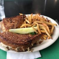 Tuna Melt · Homemade tuna salad grilled with cheddar on whole wheat bread.