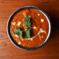Butter Chicken · Chicken cooked with herbs and ground spices in homemade butter sauce. **Onions cannot be rem...