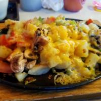 Garden Skillet · Mushroom, onion, tomato, green pepper over home fries with cheese.