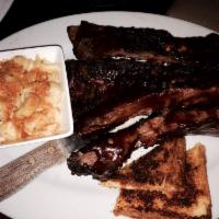 BBQ Beef Ribs · These ribs are cut from the ribeye. Includes your choice of 2 sides