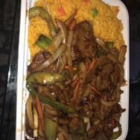 Mongolian Beef · Tender beef strips with sliced bell pepper, onion and carrots stir fried in a spicy Mongolia...