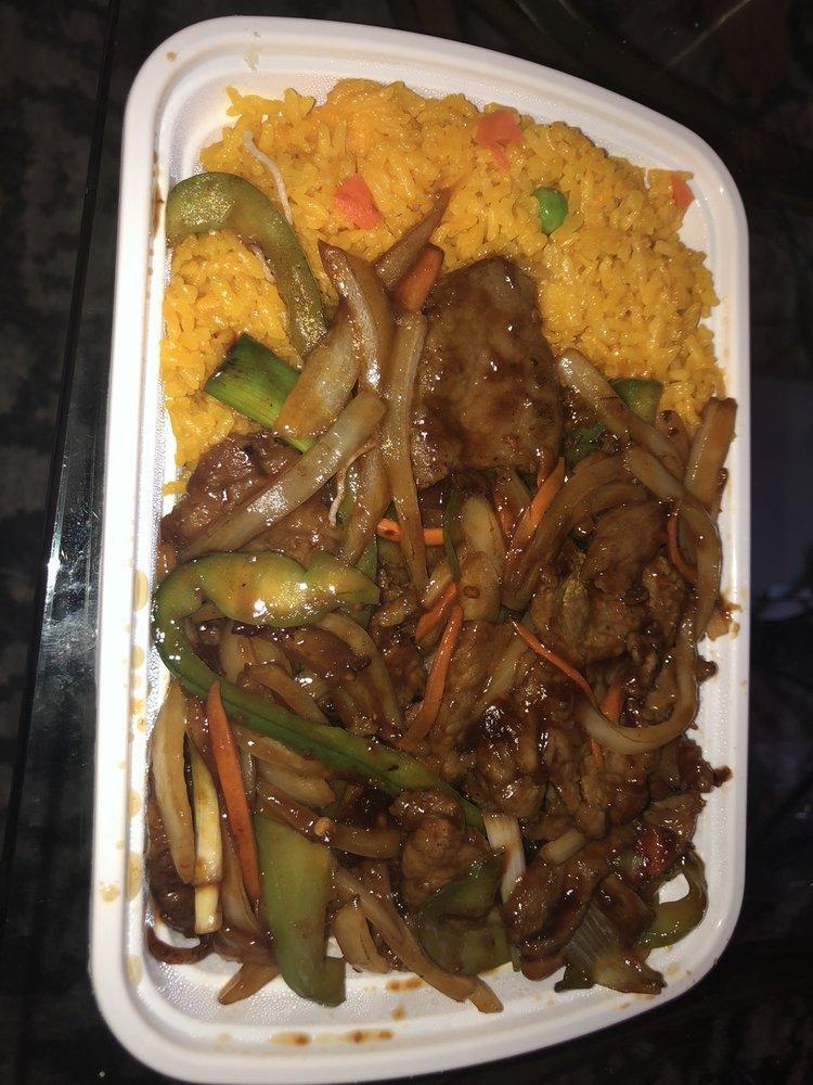 Mongolian Beef · Tender beef strips with sliced bell pepper, onion and carrots stir fried in a spicy Mongolian sauce. 