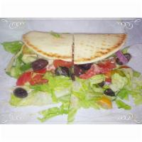 Hummus Pita Wrap · Grape tomatoes, cucumbers, red onions, red and green bell peppers, Kalamata olives, sundried...