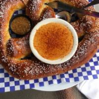 Bavarian Pretzel · Served with homemade Bavarian-style mustard. Add a side of beer cheese for an additional cha...