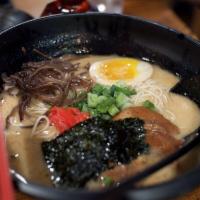 Spicy Tonkotsu Ramen · Our specialty, Hakata style Spicy ramen with pork broth cooked to perfection for roughly 12 ...