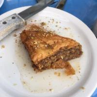Baklava · Pistachios, almonds, and walnuts in layers of honey-laced filo.